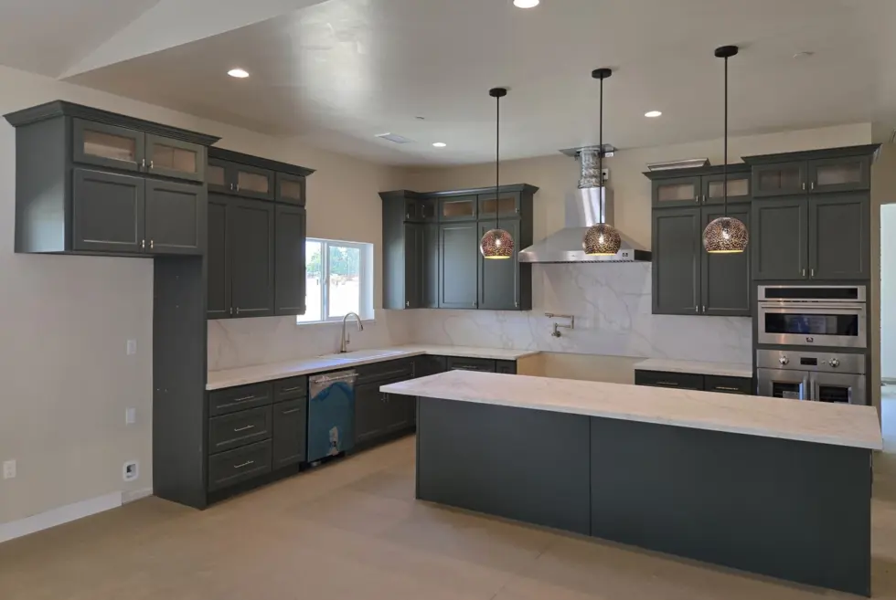 Green-prefab-cabinets-with-glass-doors-980x657.webp